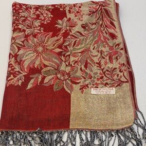 Pashmina scarf that is gold and a shade of red/burnt orange